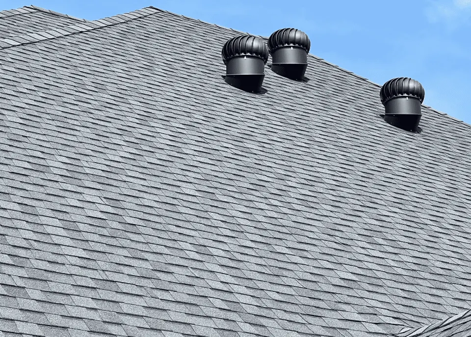 Architectural shingles with turbine vents