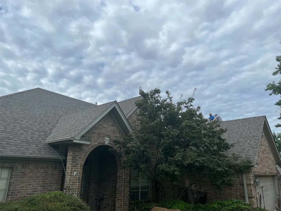 Finished roof on a home with an arched entry